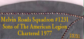 Squadron Cap, right side, (front -->) has the squadron number embrodered (front, lower right).  
On this side only, the member may attach pins related to projects or his office or past office.  
May also attach a pin or embroder an office held on any higher levels.